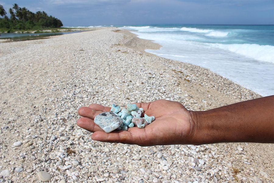Ocean beach in the Dominican Republic. Raw Larimar stones are found on the shore.