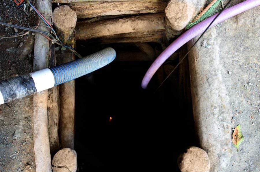 Inside of a Larimar mine. Larimar mines are rare so the mine are rustic and man-made.