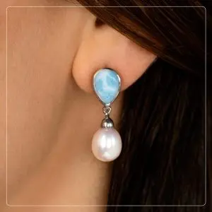 pearl symbolism. ear larimar jewelry