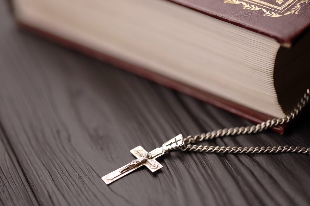 history of cross necklace and meaning