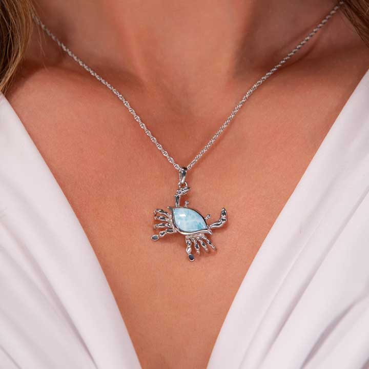 Elevate your style with Marahlago's Larimar Sterling Silver Crab Pendant Necklace. This captivating silver blue jewelry piece is perfect for women seeking elegance and a touch of coastal charm.