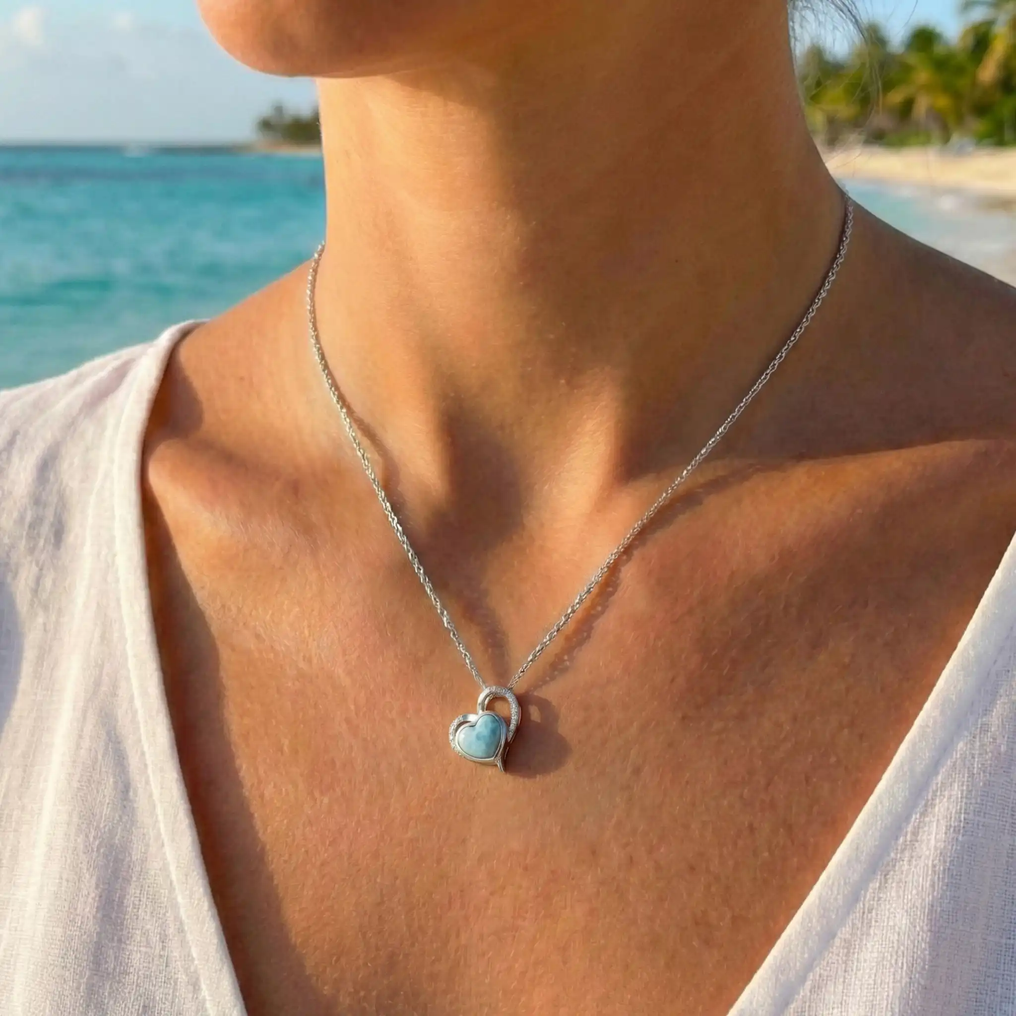 Darling Heart Pendant with White Sapphire and larimar by Marahlago. 