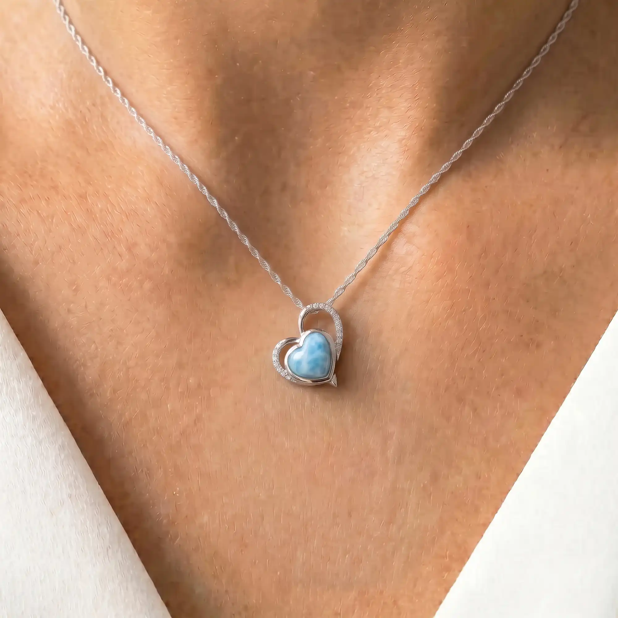 Darling Heart Pendant with White Sapphire and larimar by Marahlago. 