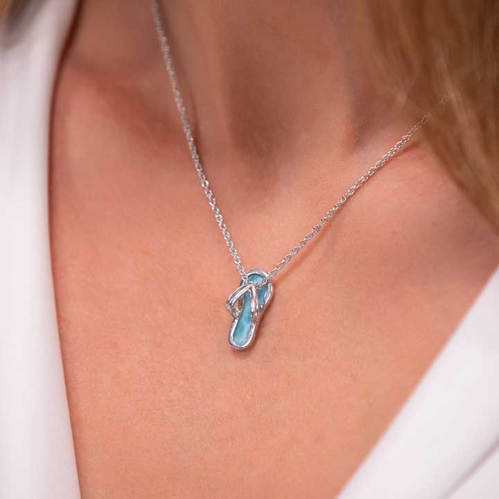 Dive into style with Marahlago's Larimar Sterling Silver Flip Flop Pendant Necklace. This ocean-inspired jewelry piece in silver blue is perfect for women seeking elegance and a touch of coastal beauty.