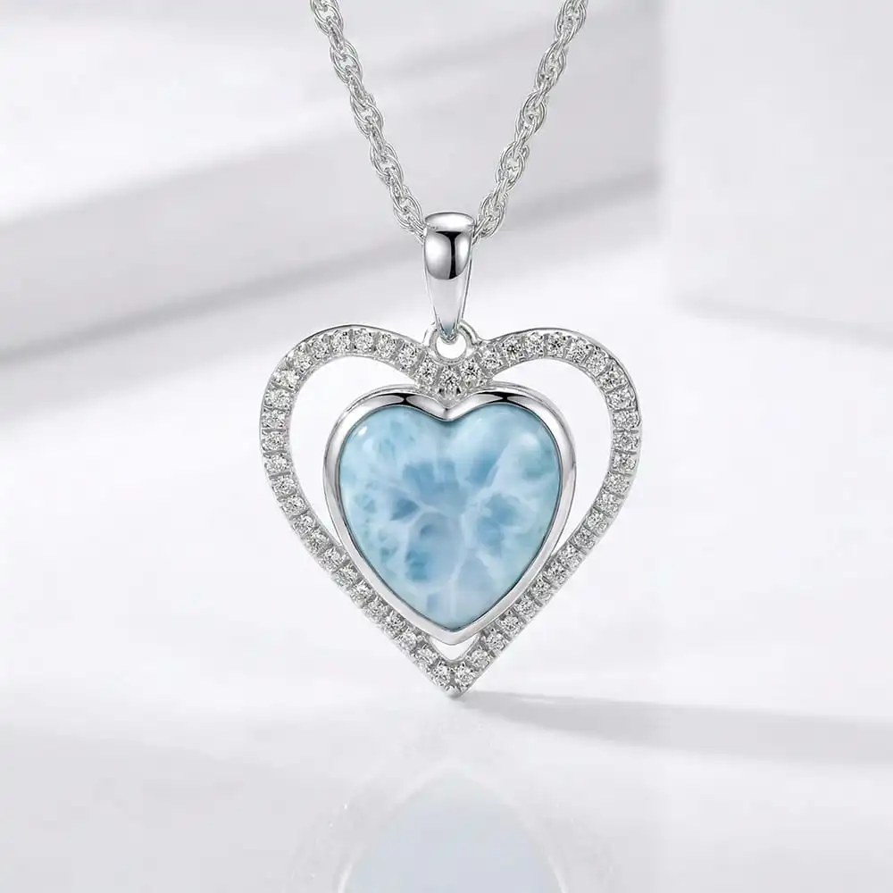 Infinity heart necklace with White Sapphire and larimar by Marahlago. 