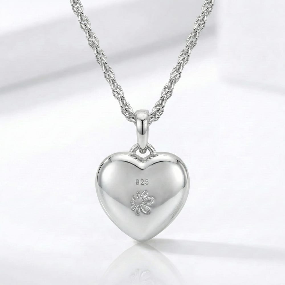 Heart shaped Necklace in sterling Silver with larimar and white sapphires by Marahlago 