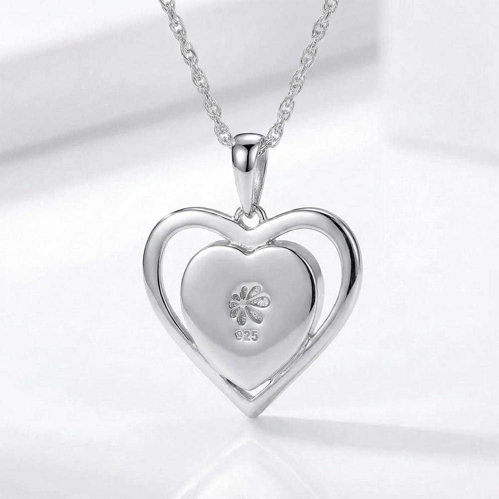 Infinity heart necklace with White Sapphire and larimar by Marahlago. 