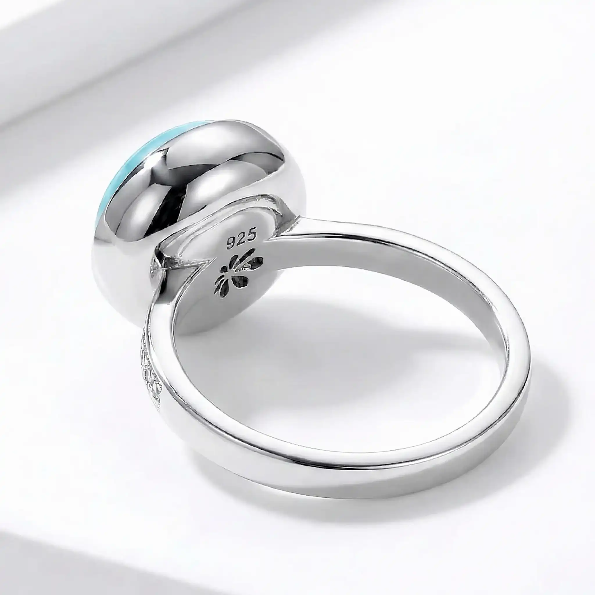 Add some style with a Round Ring with white sapphire in silver with larimar by marahlago