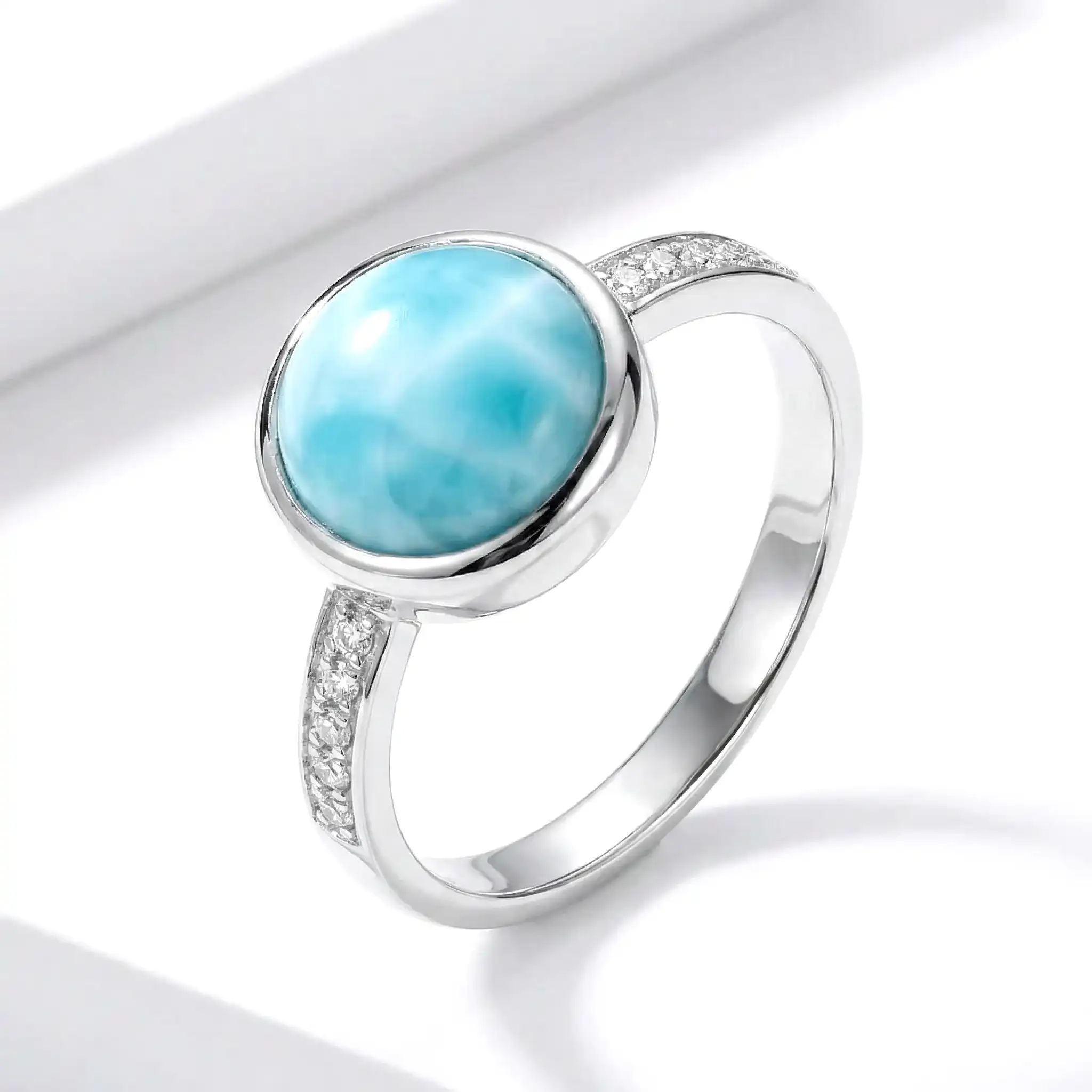 Add some style with a Round Ring with white sapphire in silver with larimar by marahlago