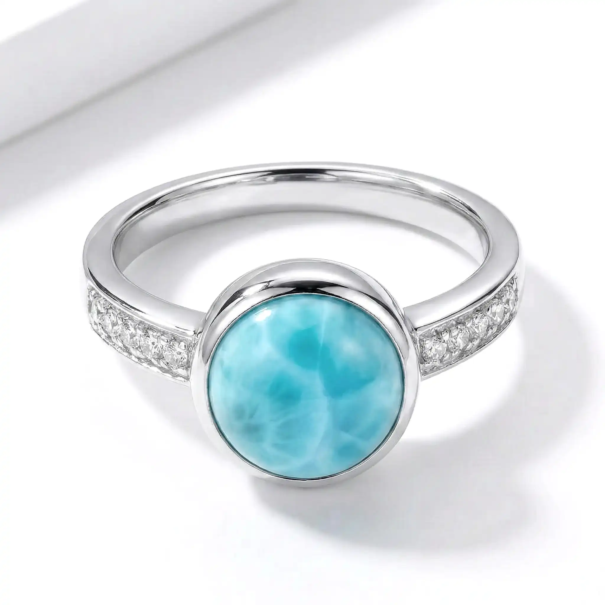 Add some style with a Round Ring with white sapphire in silver with larimar by marahlago