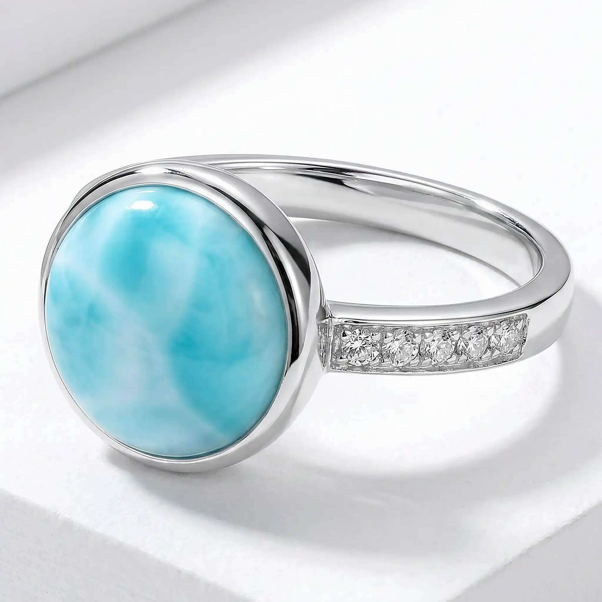 Add some style with a Round Ring with white sapphire in silver with larimar by marahlago
