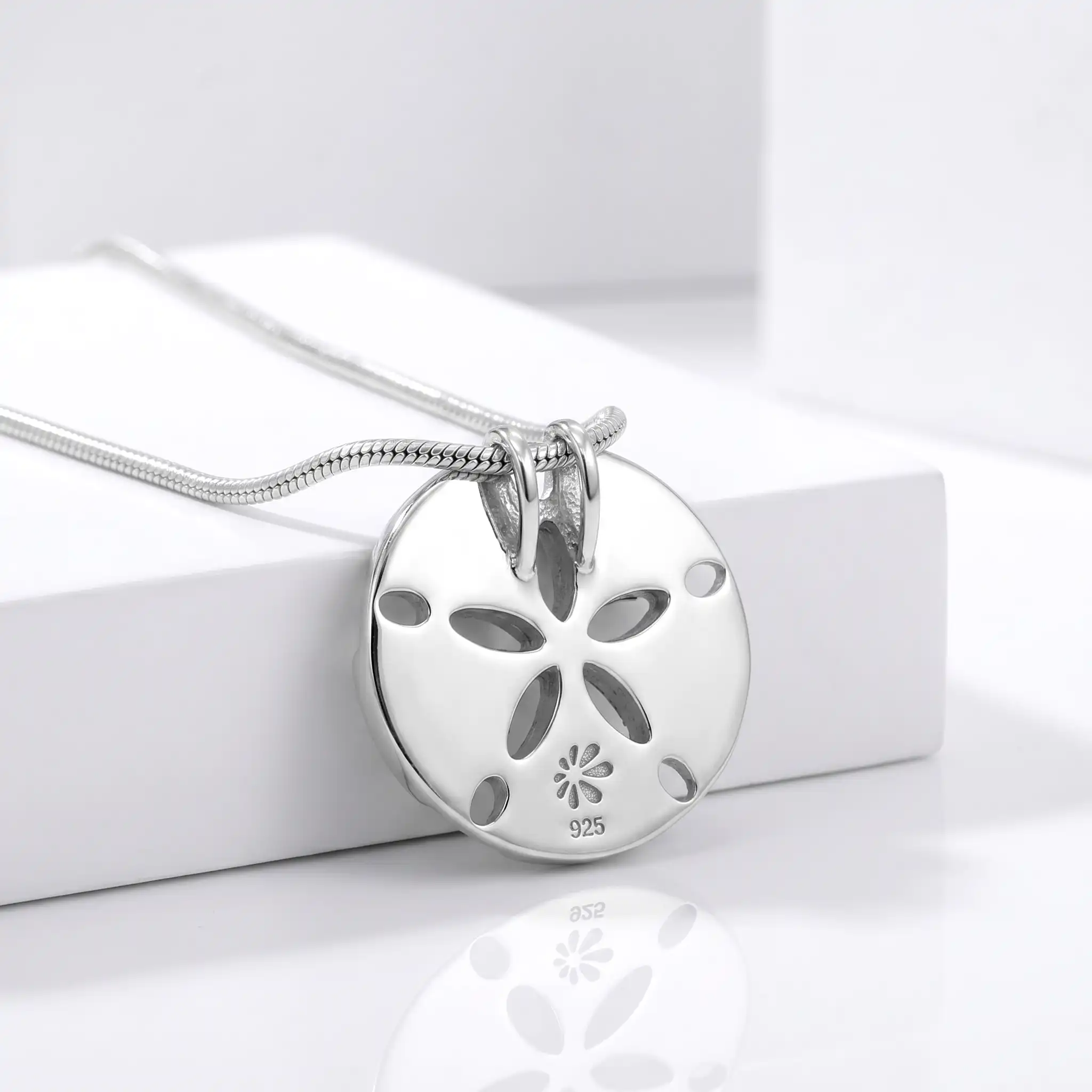 Sand Dollar Pendant on Lava Rock