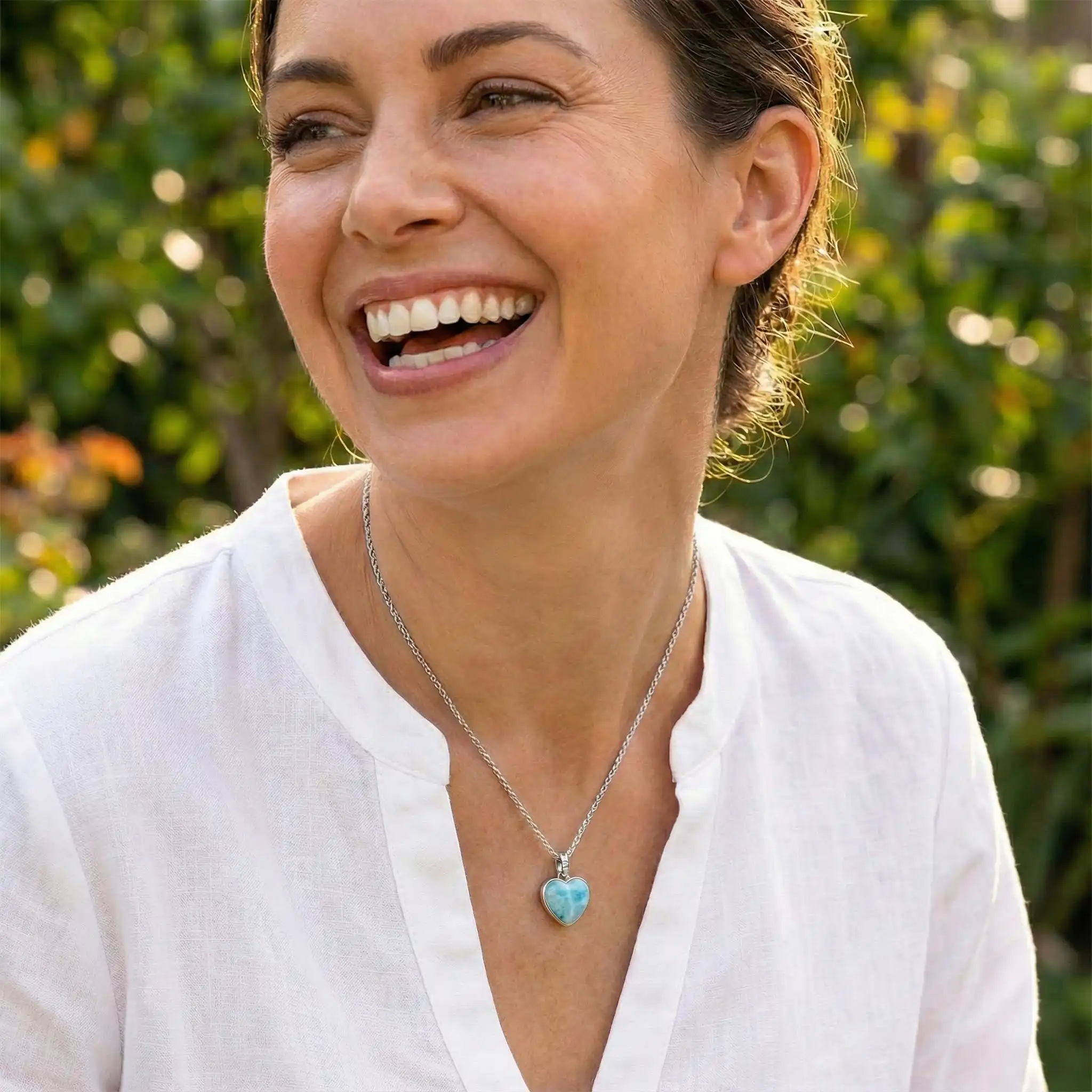 Heart shaped Necklace in sterling Silver with larimar and white sapphires by Marahlago 