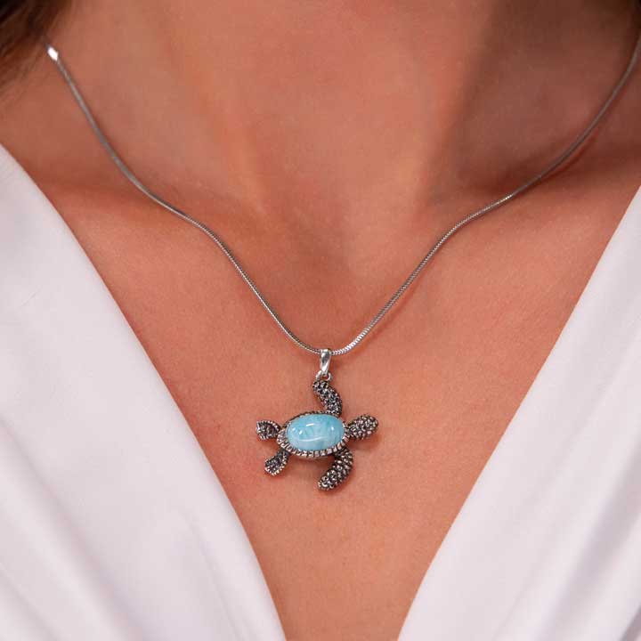 Discover the exquisite Larimar Sterling Silver Turtle Pendant Necklace by Marahlago Jewelry. Adorned with an oval silver blue gemstone